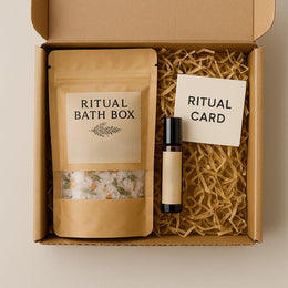 Ritual Bath Box bath soak in kraft pouch with roller oil and ritual card inside eco-friendly subscription box.