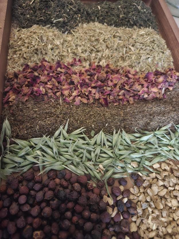 Herbal tea ingredients including nettle, oatstraw, milky oats, rose petals, tulsi and hawthorn berry