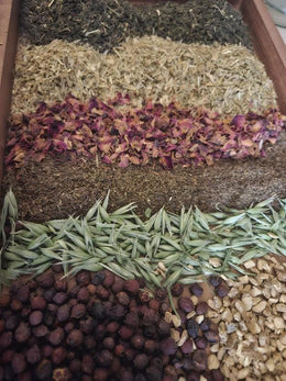 Herbal tea ingredients including nettle, oatstraw, milky oats, rose petals, tulsi and hawthorn berry